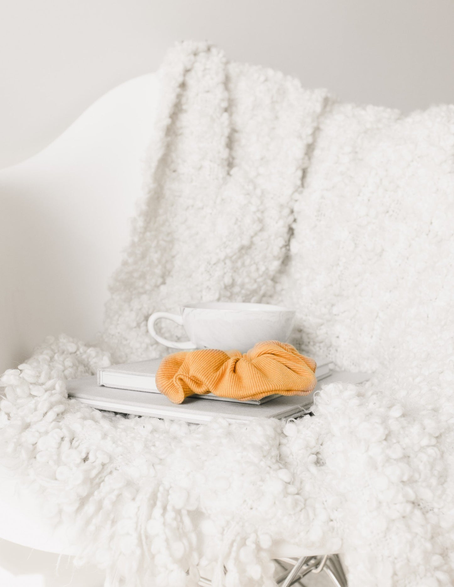 yellow scrunchie with cup of coffee